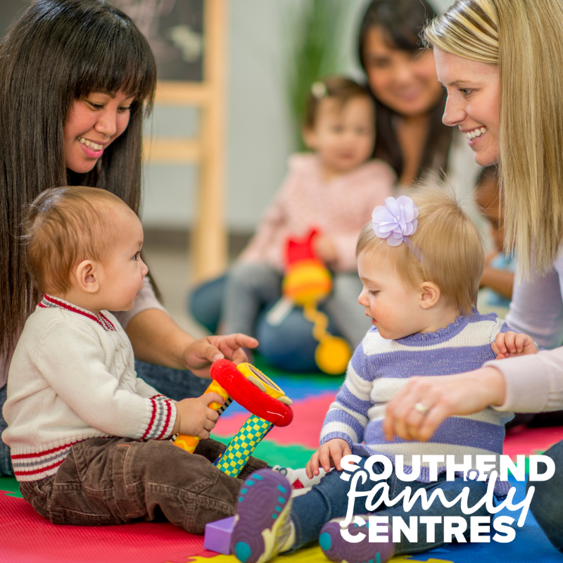 babies and carers playing