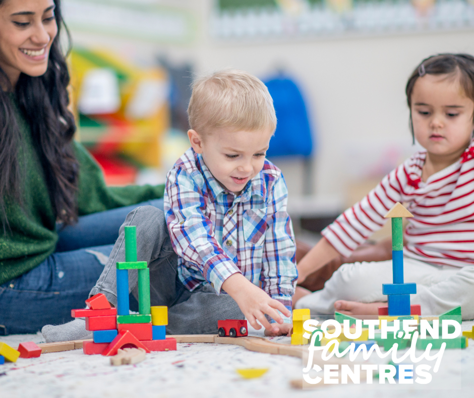 Photo of child playing with toys at a play group.